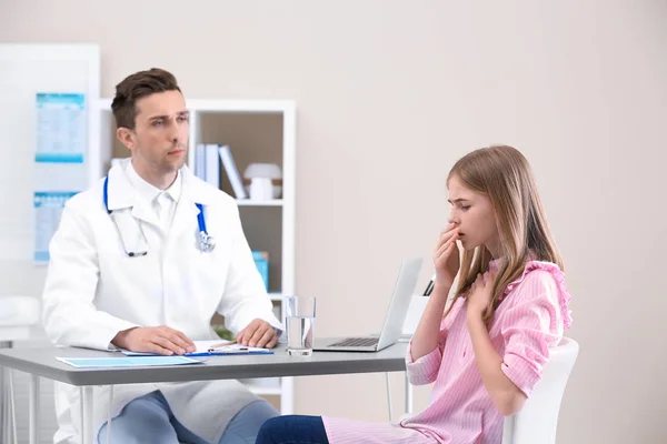 Coughing Teenage Girl Visiting Doctor Clinic — Stock Photo, Image