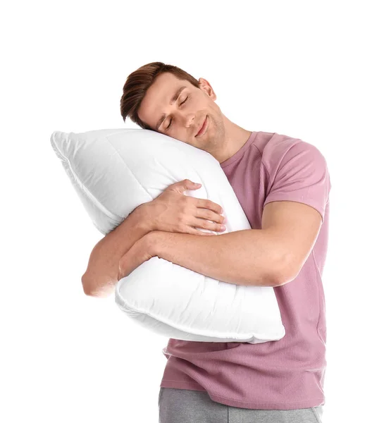 穿着睡衣的年轻人抱着枕头在白色背景上 — 图库照片