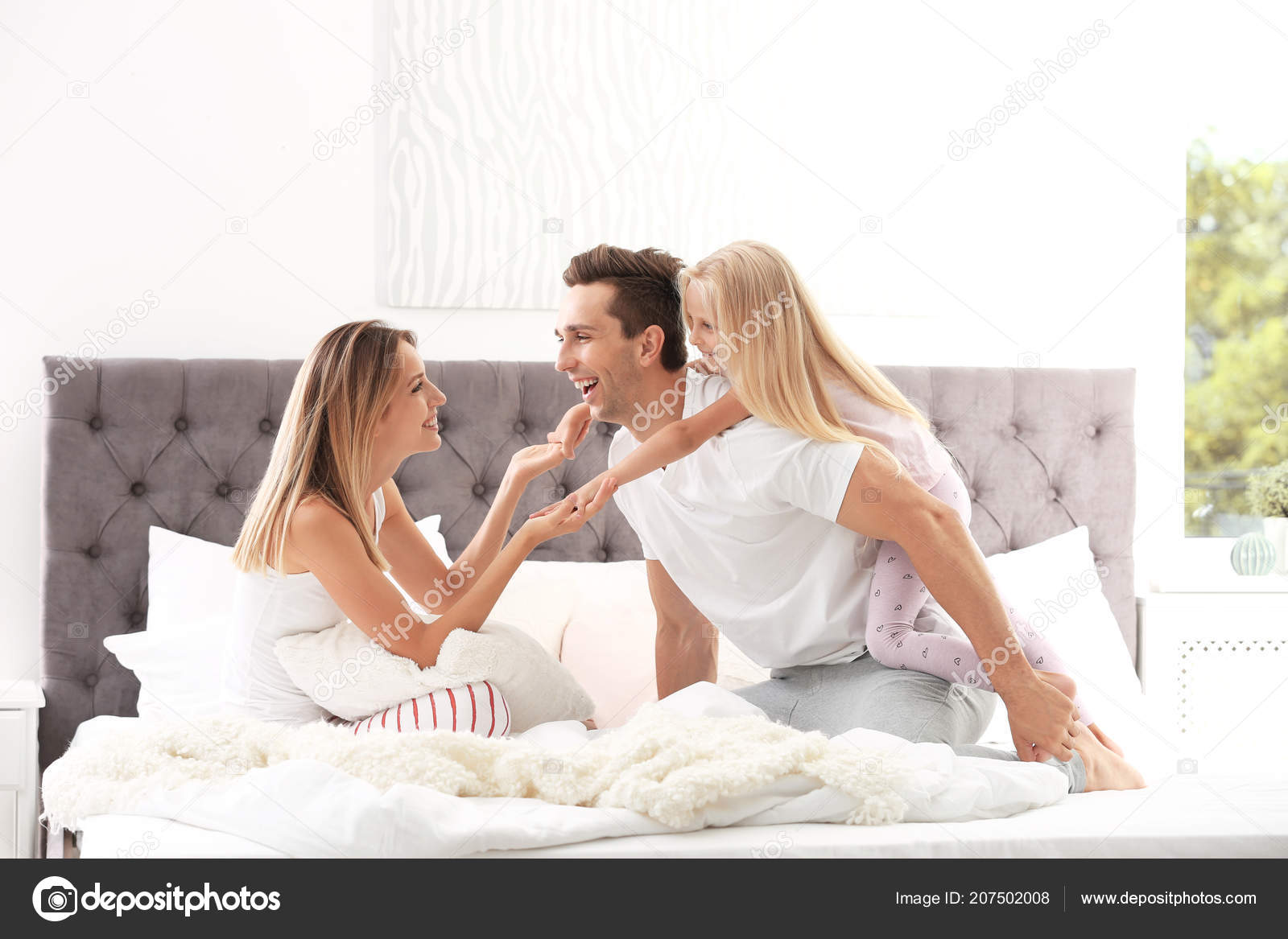 Happy Family Having Fun Bed Pillows Home Weekend Morning
