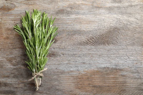 Fresh Rosemary Twigs Tied Twine Wooden Table Top View — Stock Photo, Image