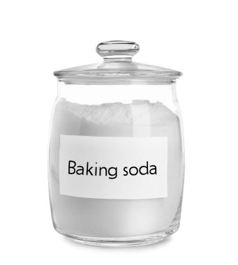 Jar with baking soda on white background clipart