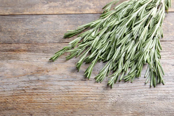 Fresh Rosemary Twigs Wooden Table — Stock Photo, Image