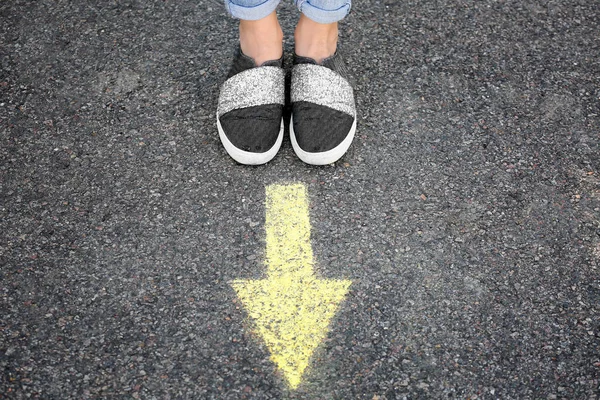 Woman Standing Road Arrow Marking Closeup — Stock Photo, Image