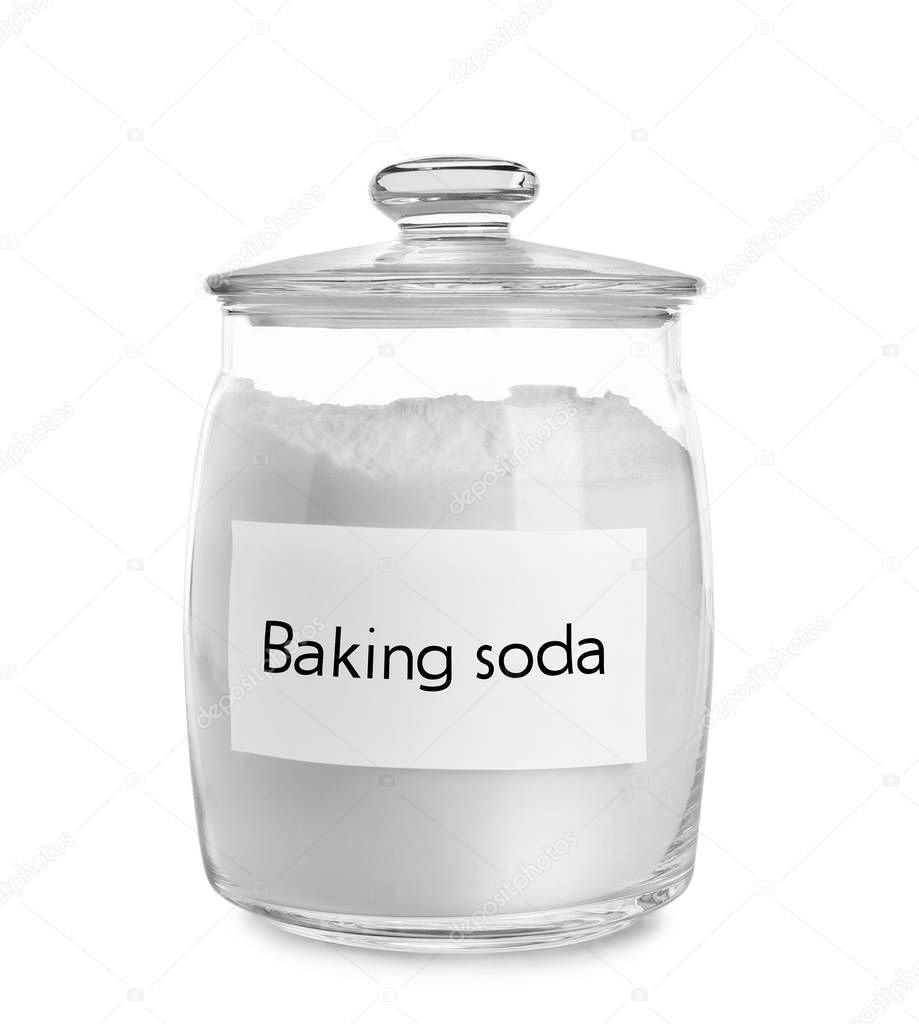 Jar with baking soda on white background