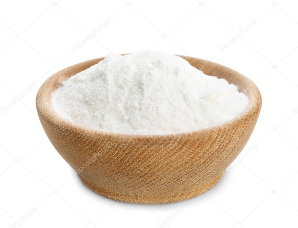Wooden bowl with baking soda on white background
