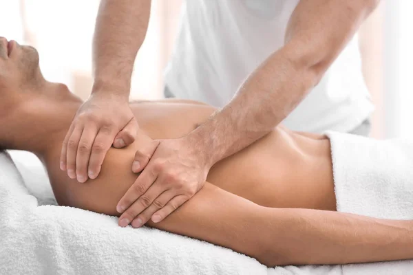 Young Man Receiving Massage Salon Closeup — Stock Photo, Image