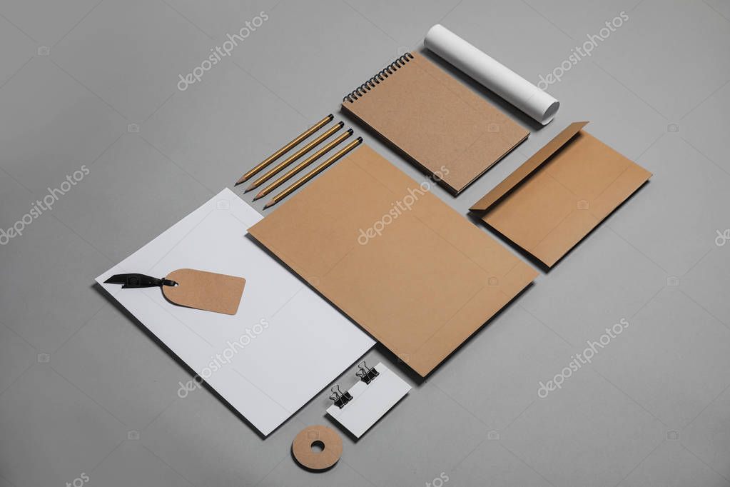 Composition with stationery on grey background. Mock up for design