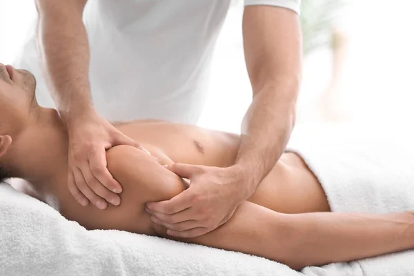 Young Man Receiving Massage Salon Closeup — Stock Photo, Image