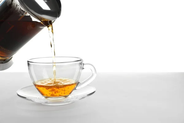 Pouring Hot Tea Glass Cup White Background — Stock Photo, Image