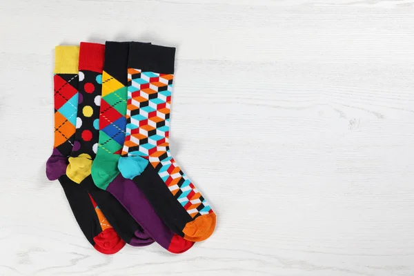 Plochá Laických Složení Různými Ponožky Prostor Pro Design Světlé Dřevěné — Stock fotografie