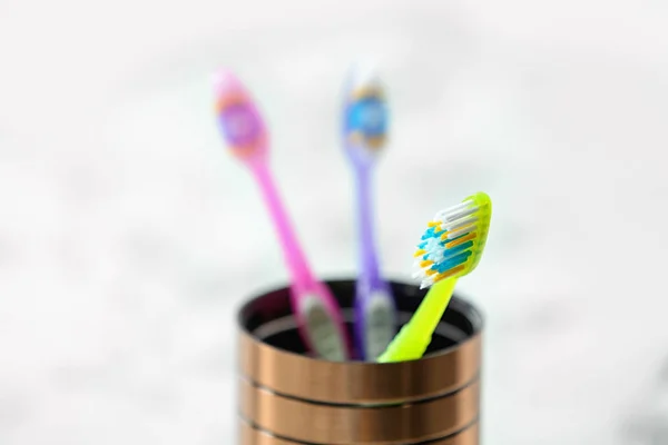 Cup Toothbrushes Table Closeup Dental Care — Stock Photo, Image
