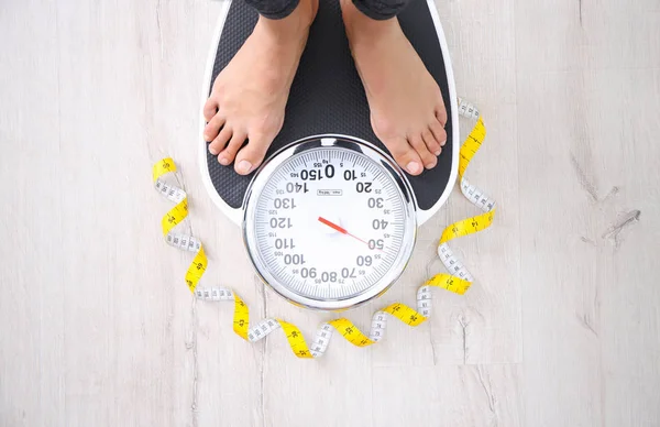 Woman Measuring Her Weight Using Scales Tape Floor Top View — Stock Photo, Image