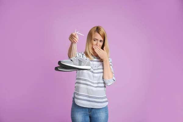 Young Woman Stinky Shoes Color Background Air Freshener — Stock Photo, Image