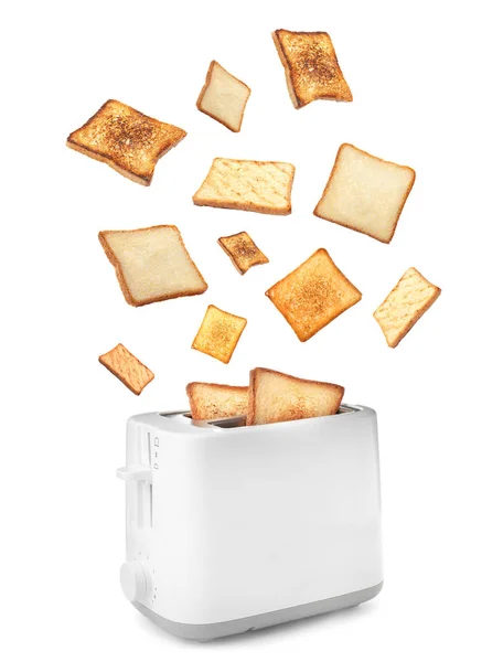 在白色背景下从烤面包机上飞出来的脆面包片 — 图库照片