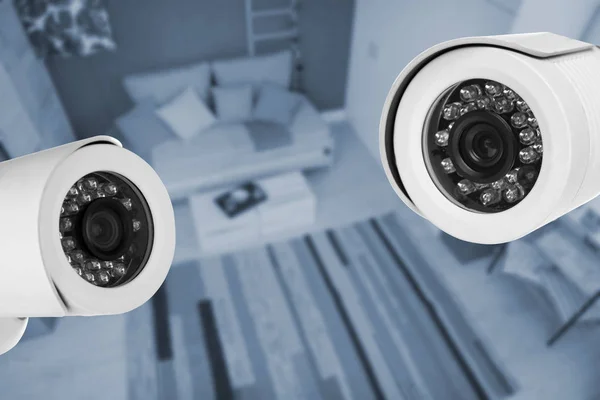 Living room under CCTV cameras surveillance, above view