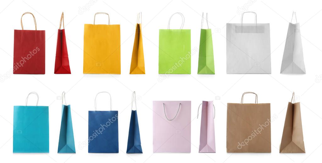 Set with shopping bags on white background