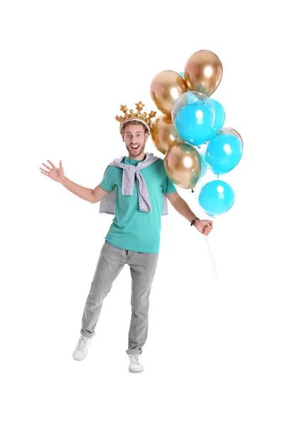 白色背景的冠和空气气球的年轻人 — 图库照片
