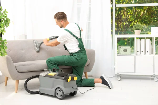 Male Janitor Removing Dirt Sofa Upholstery Cleaner Room — Stock Photo, Image