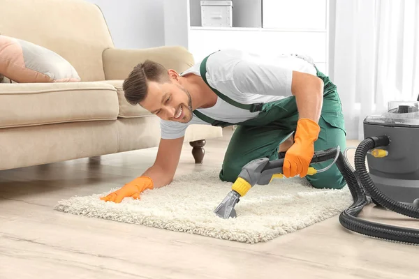 Male Janitor Removing Dirt Rug Carpet Cleaner Room — Stock Photo, Image