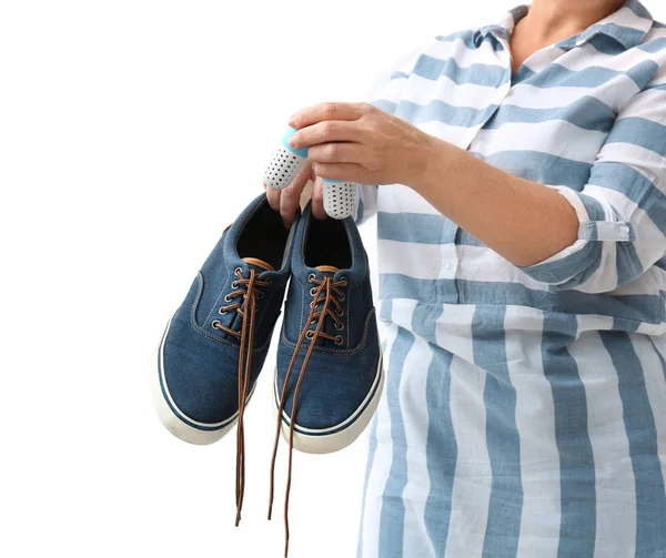Woman Putting Capsule Shoe Freshener Footwear White Background Closeup — Stock Photo, Image