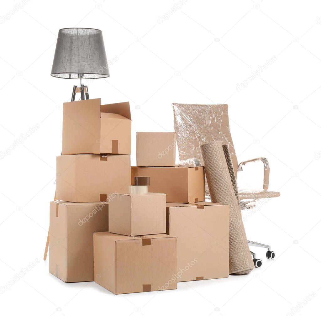 Cardboard boxes and household stuff on white background. Moving day