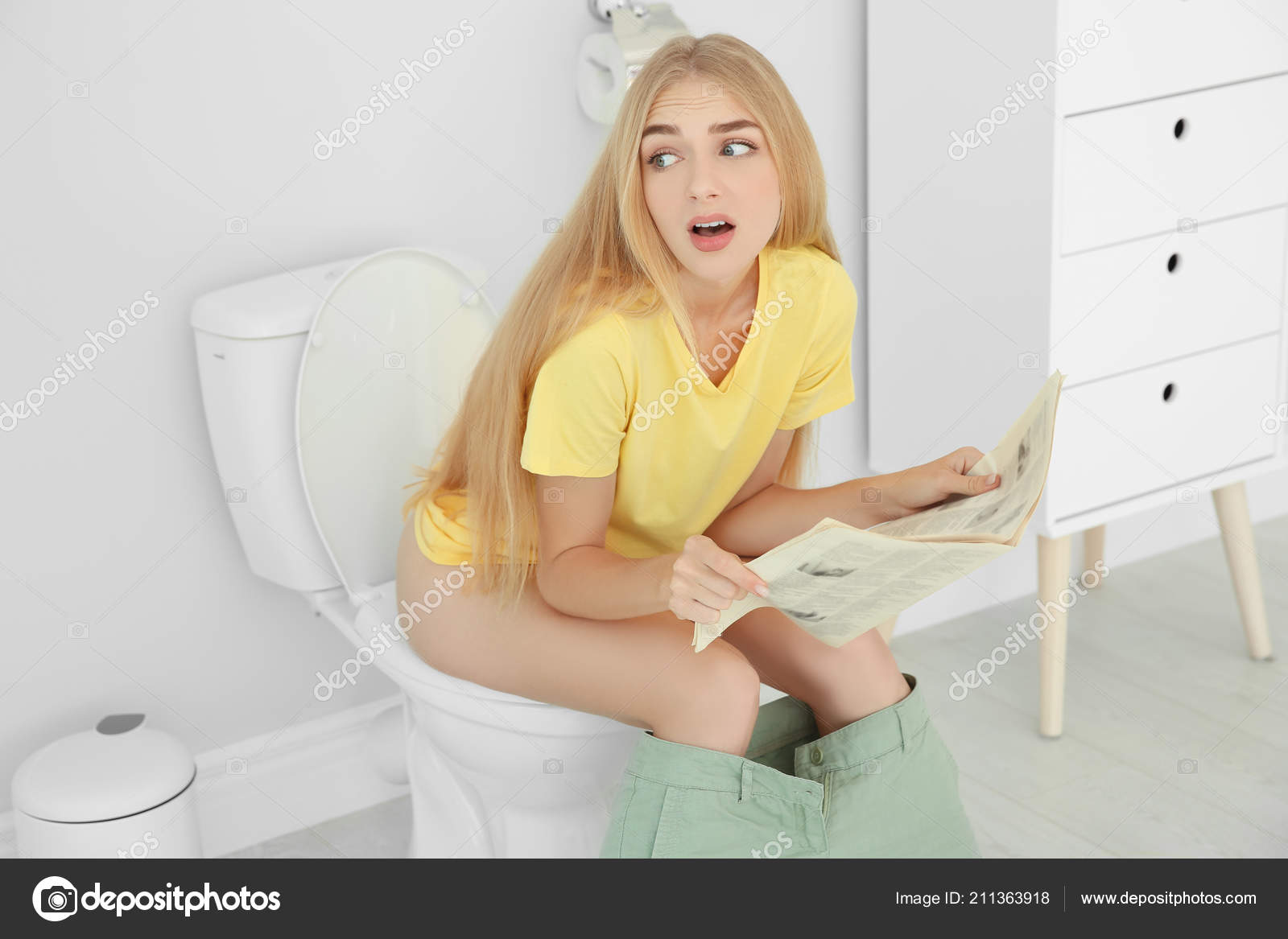 Young Woman Reading Newspaper While Sitting Toilet Bowl Home Stock Photo Image By C Newafrica Young Woman Reading Newspaper While Sitting Toilet Bowl Home Stock Photo Image By C Newafrica