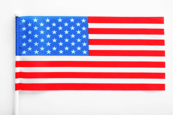 American flag on white background, top view