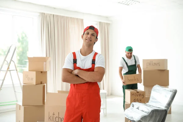 Male Movers Unloading Boxes Van Outdoors — Stock Photo, Image