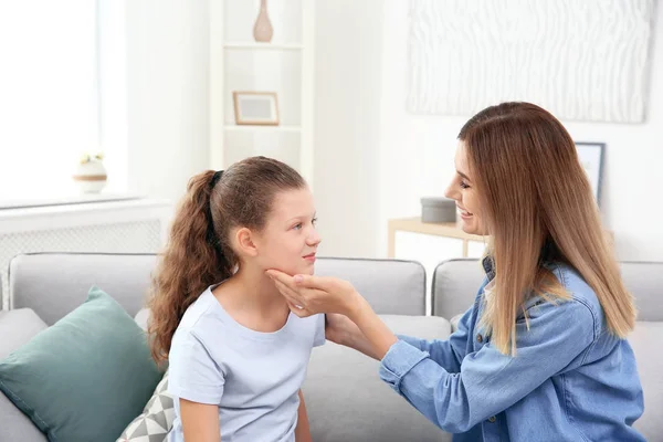 Young Woman Checking Little Girl Pulse Indoors — Stock Photo, Image