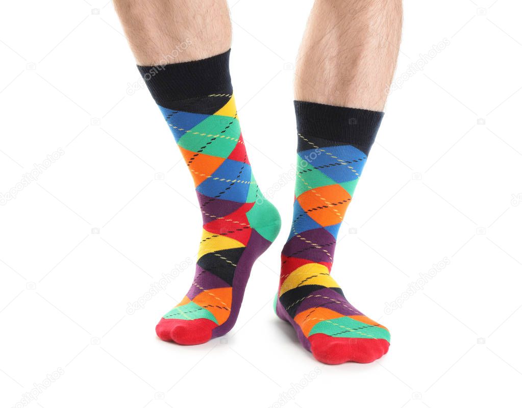 Man in stylish socks on white background, closeup