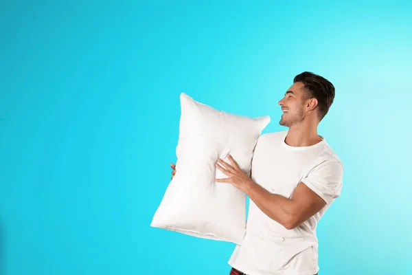 Young Man Soft Pillow Color Background — Stock Photo, Image