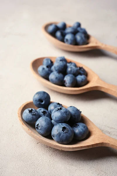 Wooden Spoons Juicy Blueberries Color Table — Stock Photo, Image