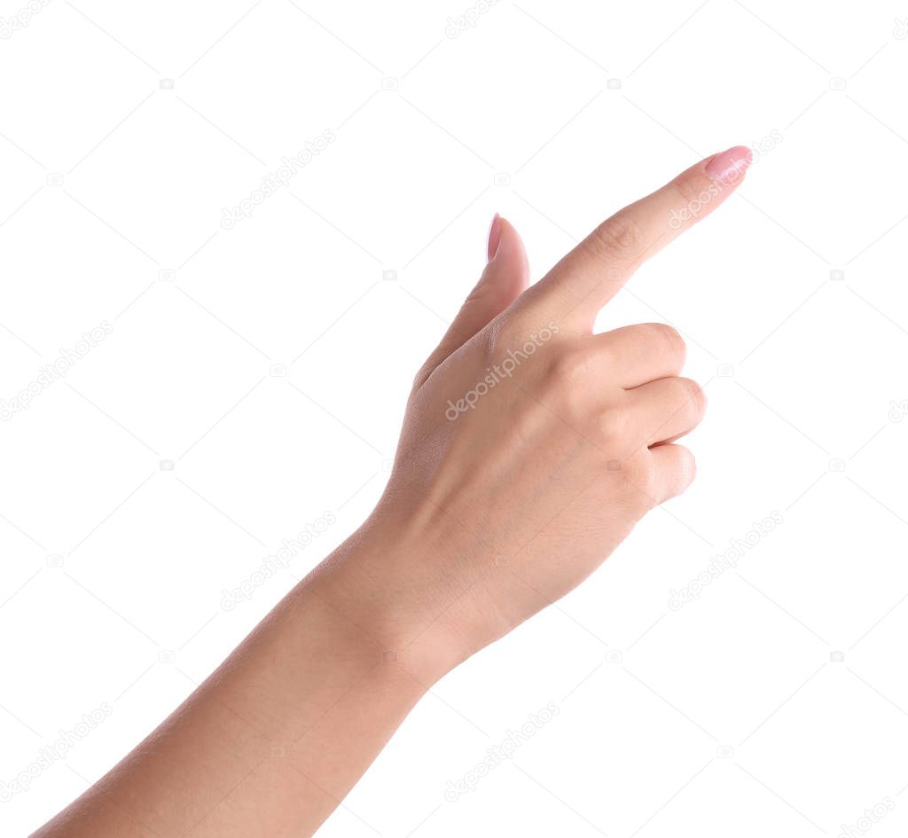 Woman pointing to something on white background, closeup