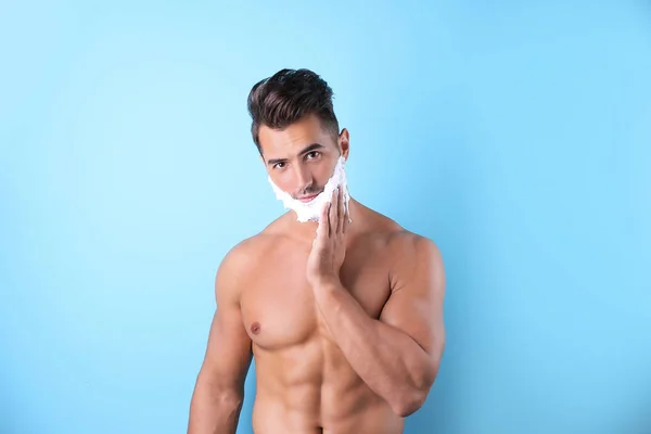Handsome Young Man Applying Shaving Foam Color Background — Stock Photo, Image