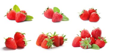 Beyaz arka planda lezzetli çileklerle ayarlanmış.