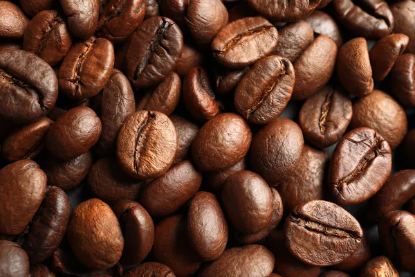 Rostade Kaffe Bönor Som Bakgrund Ovanifrån — Stockfoto