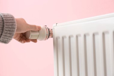 Kadın ısıtma radyatör renk arka plan ayarlama