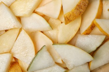 Arka plan, closeup görünümü olarak olgun lezzetli kavun dilimleri