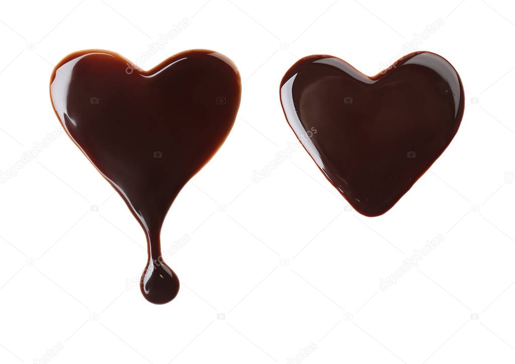 Set with hearts made of molten chocolate on white background