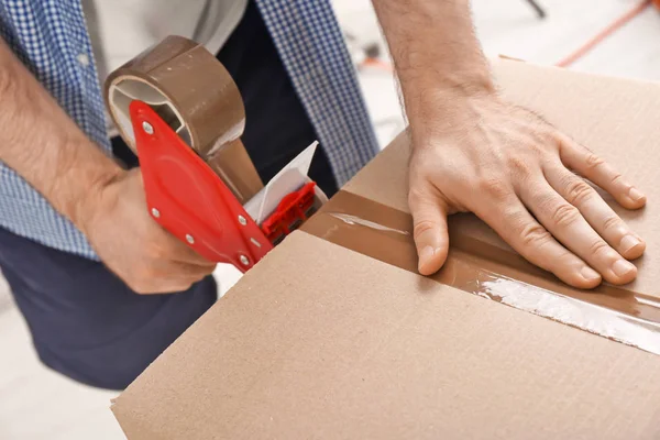 Man Packing Cardboard Box Closeup Moving Day — Stock Photo, Image