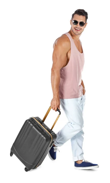 Junger Mann Geht Mit Koffer Auf Weißem Hintergrund — Stockfoto
