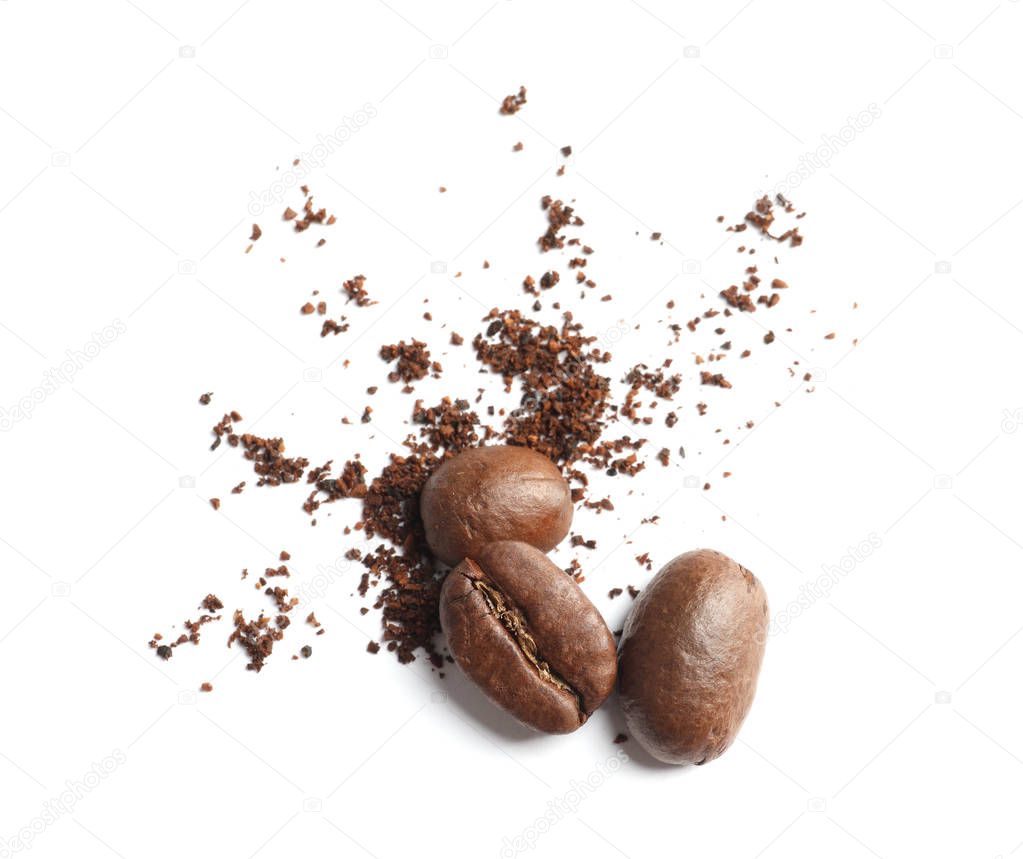 Coffee grounds and roasted beans on white background, top view