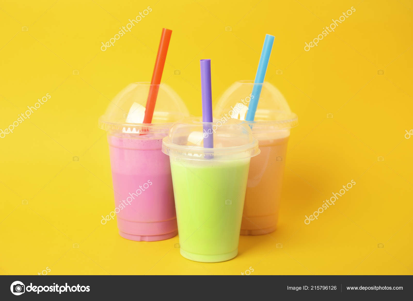 Milkshake clear plastic Cup Stock Photo - Alamy