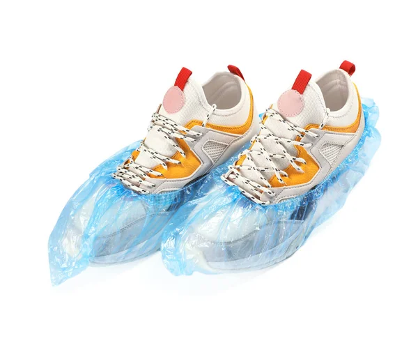 Pair Sneakers Medical Blue Covers White Background — Stock Photo, Image