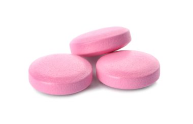 Beyaz arka plan üzerinde renkli hapları. Tıbbi bakım