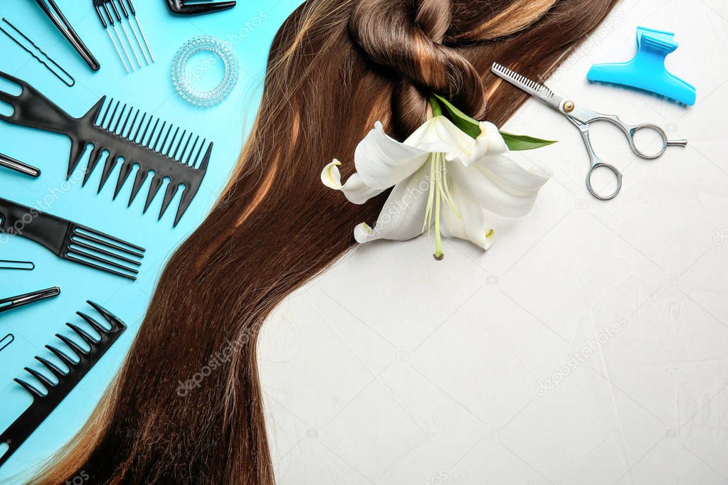 Flat lay composition with hair salon tools and space for text on gray background