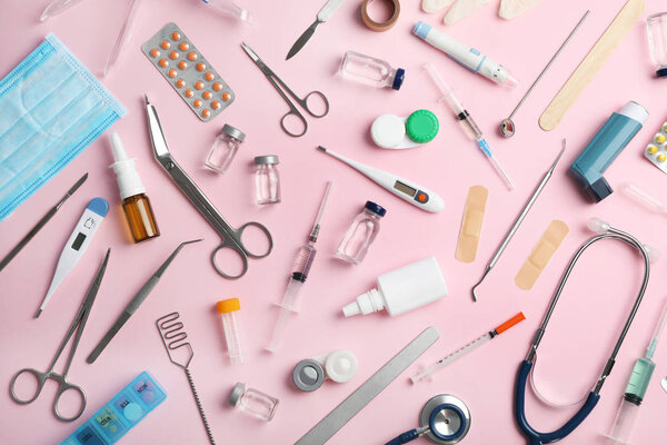 Many different medical objects on color background, flat lay