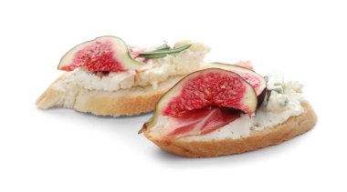 Olgun incir, prosciutto ve beyaz zemin üzerine krem peynir sandviç