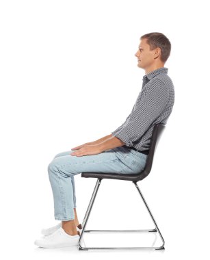 Man with good posture sitting on chair against white background clipart