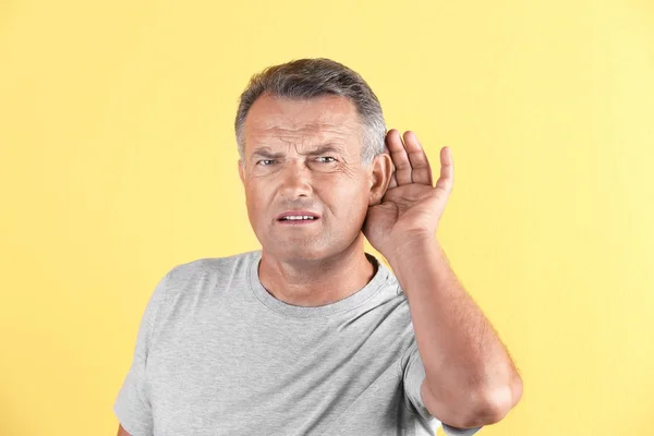 Mature Man Hearing Problem Color Background — Stock Photo, Image
